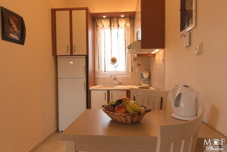Apartment | Private kitchen | Fridge, stovetop, cookware/dishes/utensils