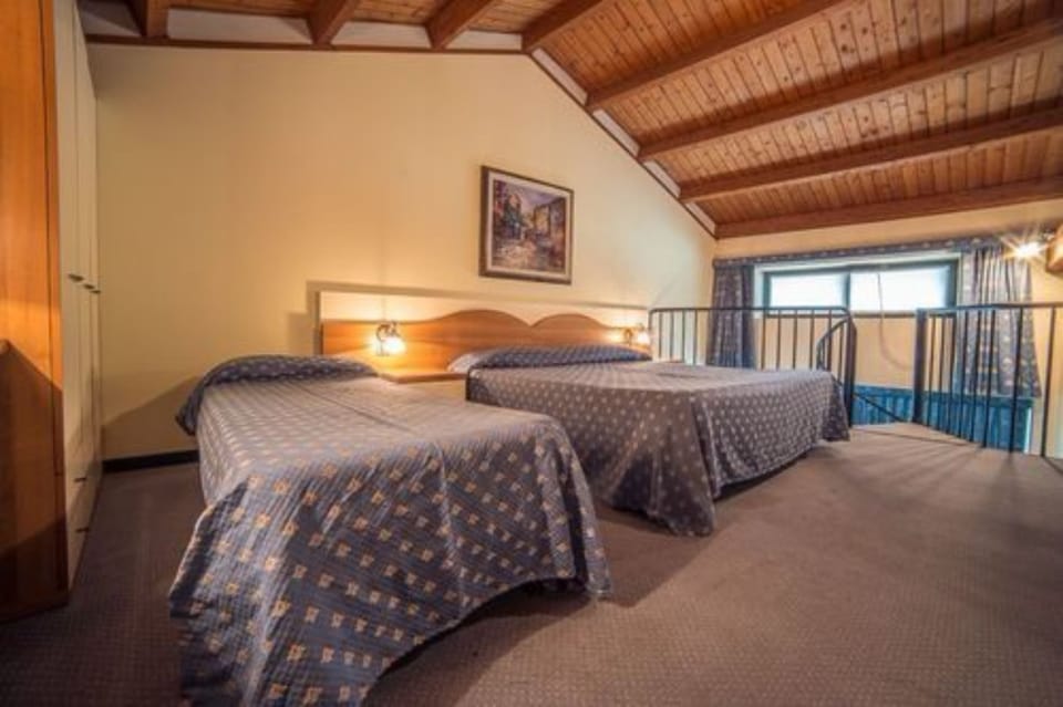 Family Room, Annex Building | Frette Italian sheets, Select Comfort beds, minibar, in-room safe