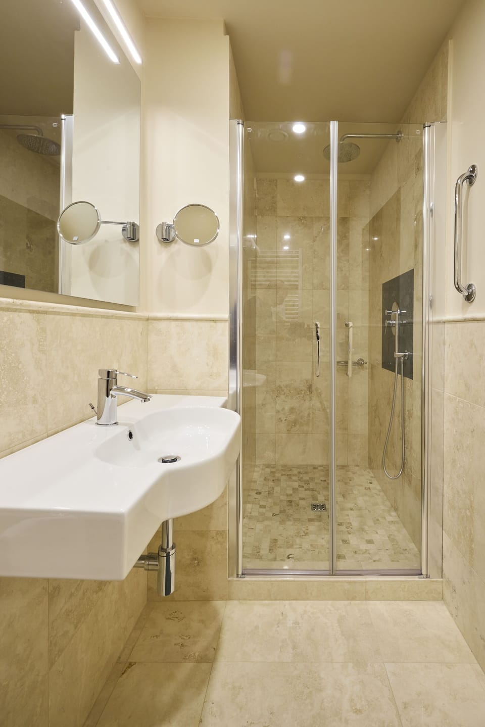Designer toiletries, hair dryer, slippers, bidet