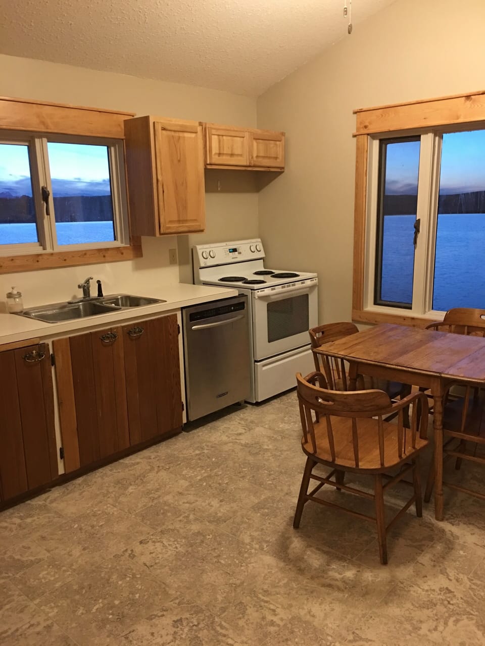 Our kitchen looks right out onto our little lake at the farm