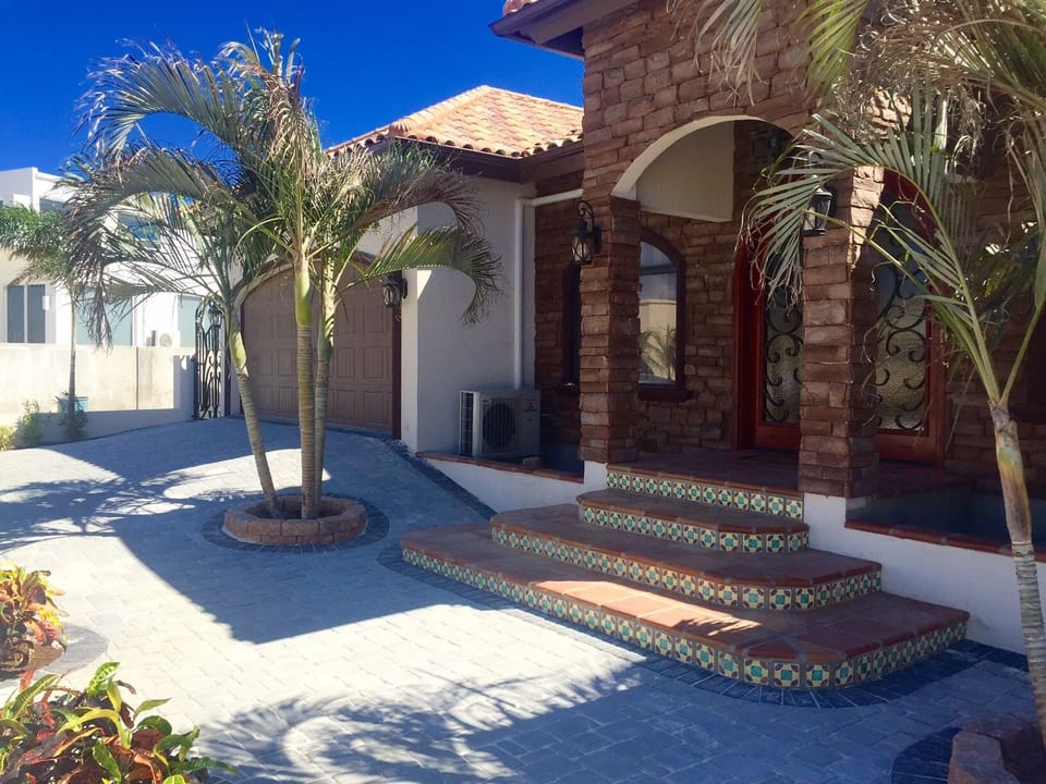 Spanish style steps with Talavera tile entry