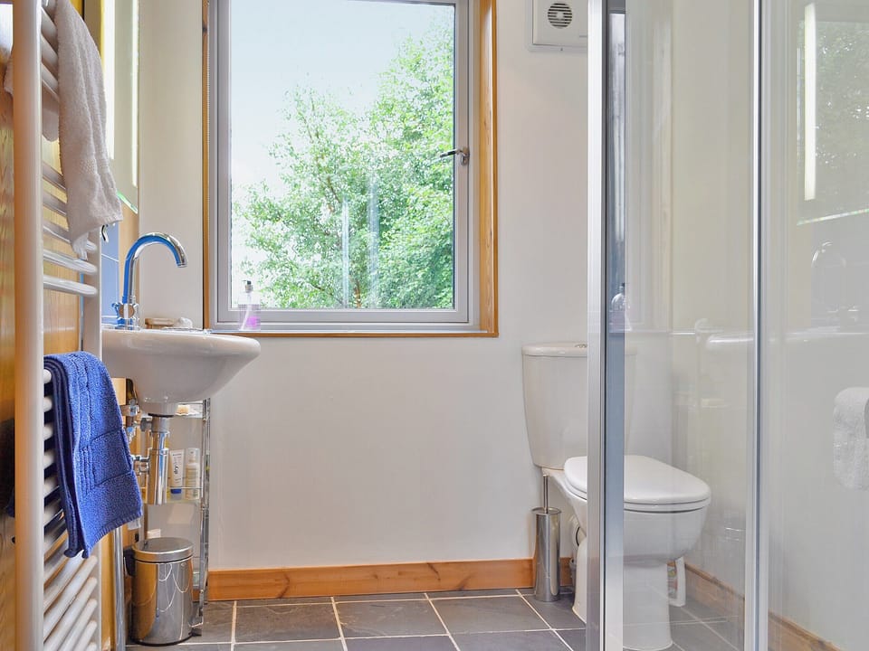 Tile floored shower room with heated towel rail | West Bothy at Cluain Ghrianach, Laga, near Acharacle