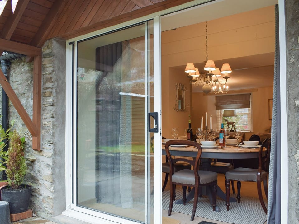 Patio door to dining area | Smiddy Cottage, Weem, near Aberfeldy