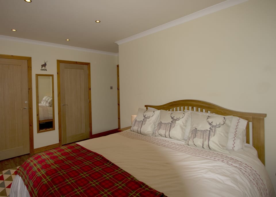Bedroom one with king size bed