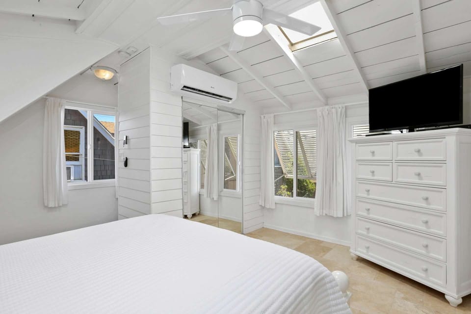 The master bedroom has its own air conditioning unit to keep cool in the evening.