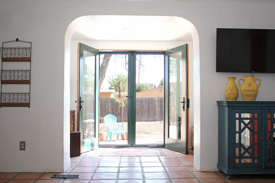French doors leading to private backyard