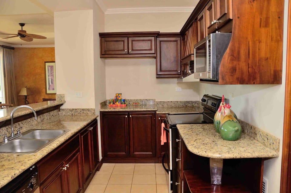 Lovely kitchen with all amenities. Granite counter tops. 