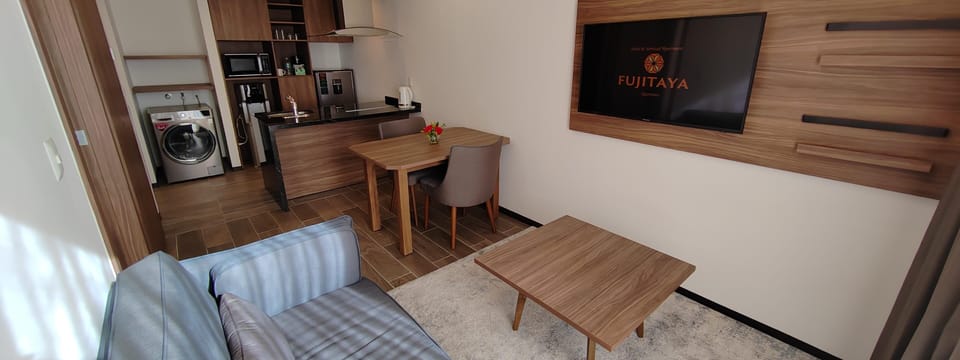 Junior Suite, 1 Queen Bed, Non Smoking | Living area | 49-inch TV with cable channels