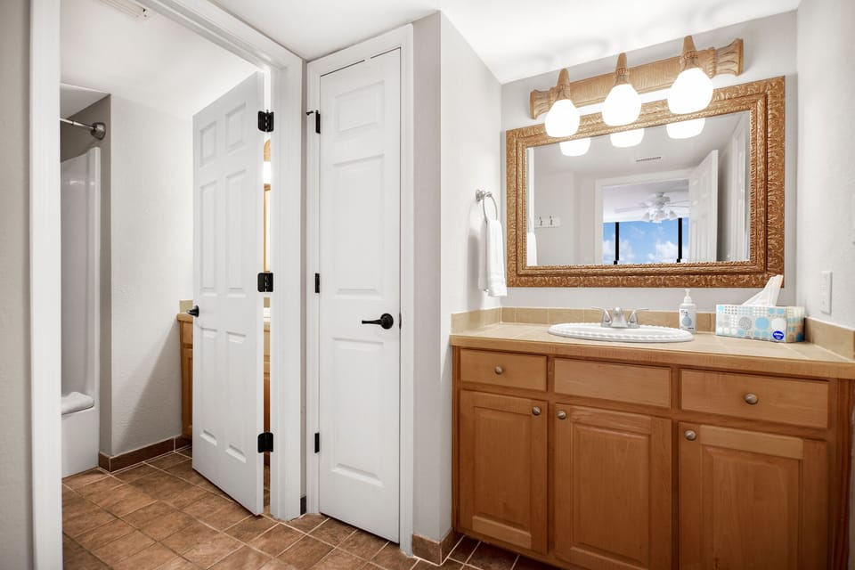 Ensuite queen bath,  separate shower/tub combo and separated sink areas
