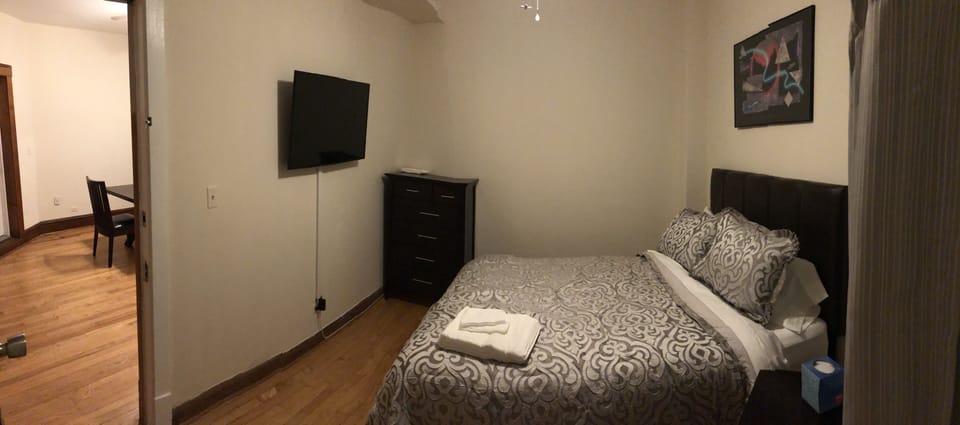 Master bedroom with 40 inch flat screen tv and queen mattress!