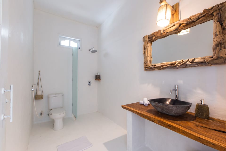 Suite, Pool View | Bathroom | Shower, free toiletries, hair dryer, towels