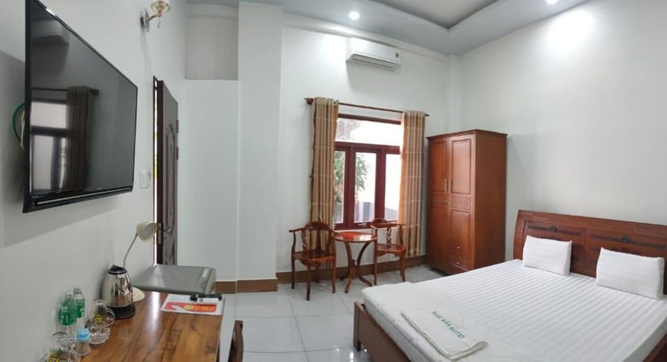 Deluxe Double Room | Minibar, desk, laptop workspace, blackout drapes
