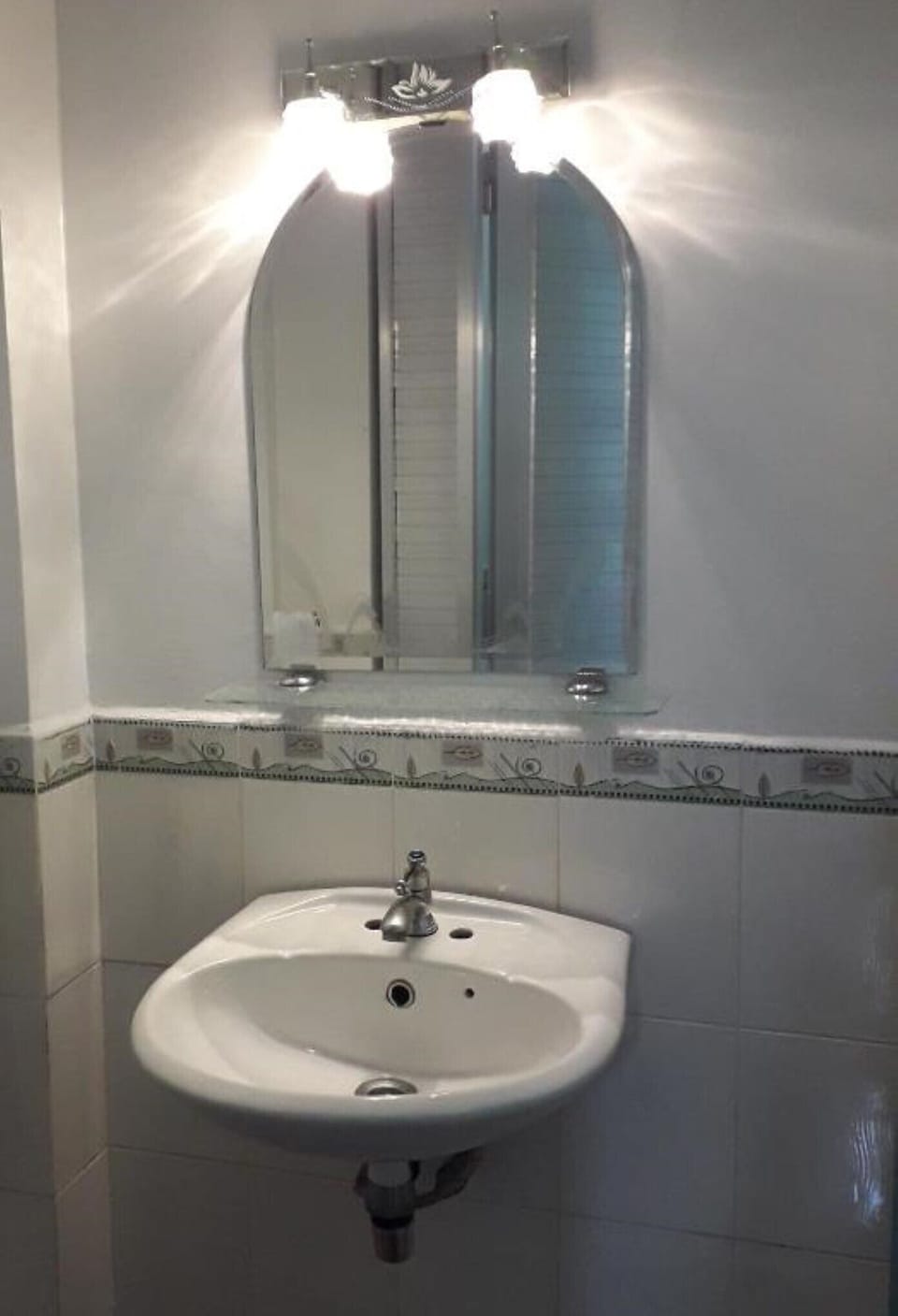 Shower, free toiletries, hair dryer, slippers