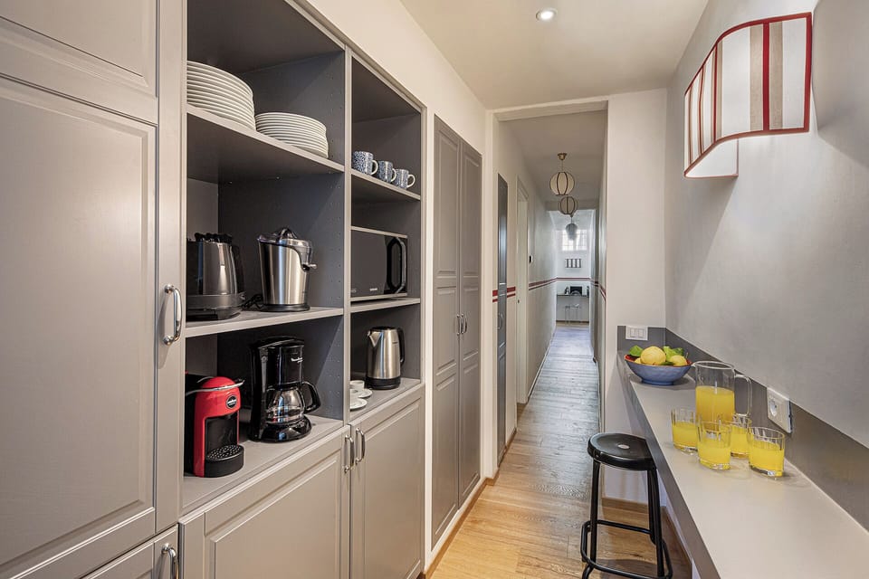 Kitchen detail and hallway leading to the bedrooms