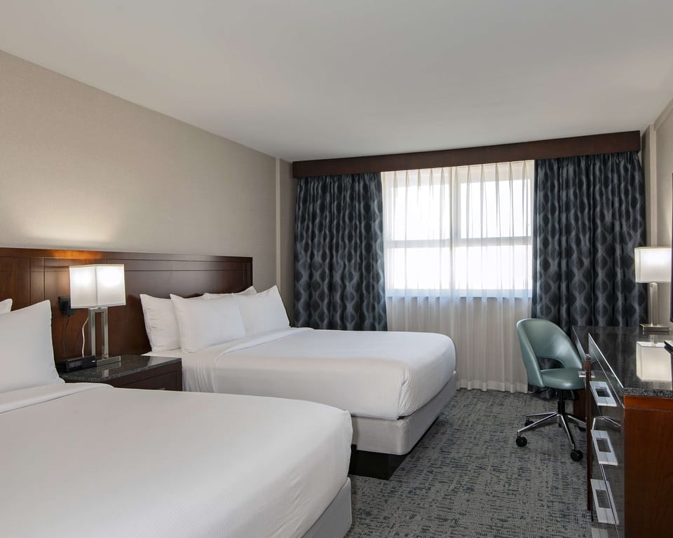 Room, 2 Queen Beds | In-room safe, desk, cribs (free), WiFi (free)
