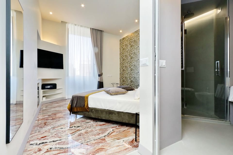 Deluxe Double Room | Bathroom | Shower, rainfall showerhead, hair dryer, bidet