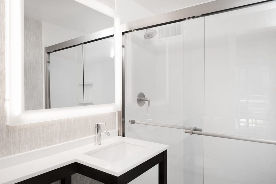 Combined shower/tub, eco-friendly toiletries, hair dryer, towels