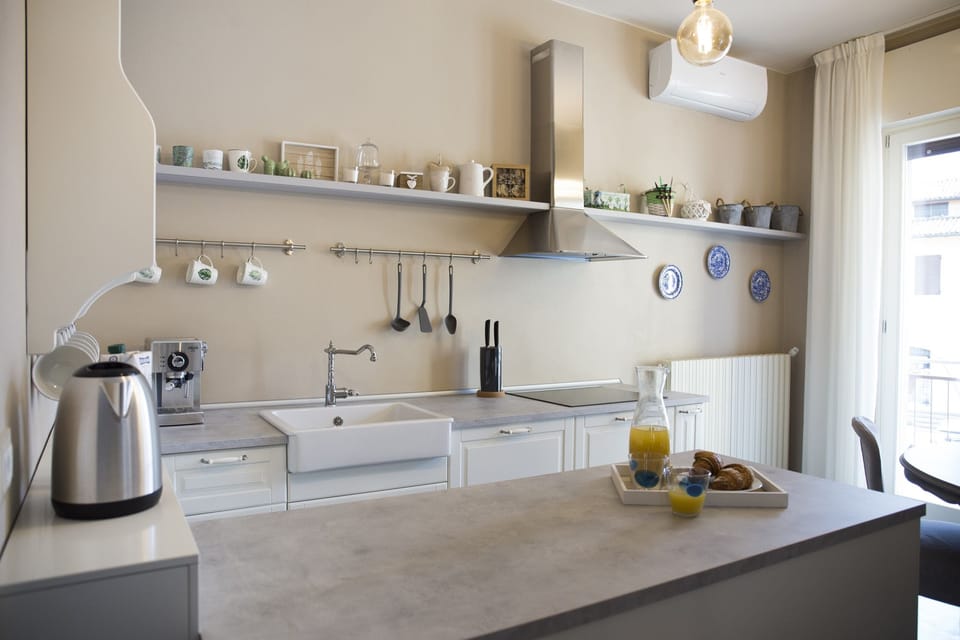 Full-size fridge, stovetop, dishwasher, espresso maker