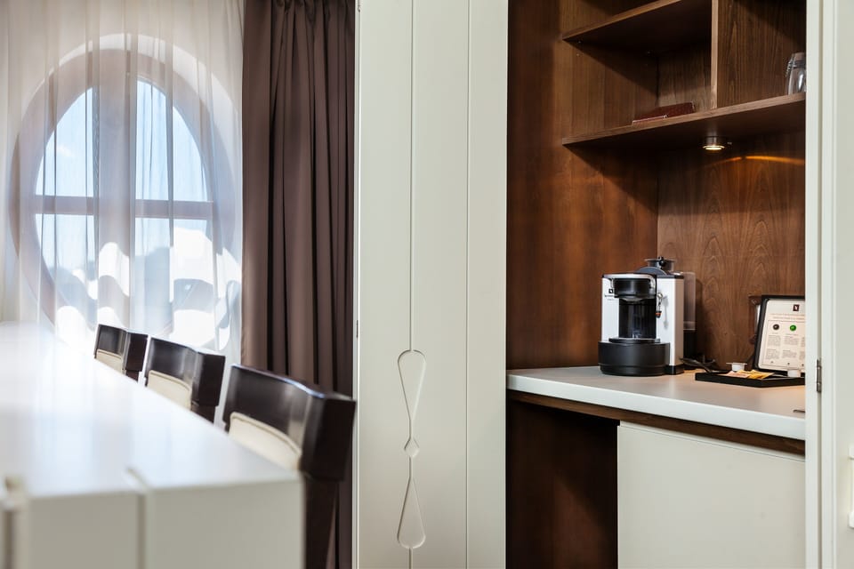 Presidential Suite (Cismigiu VIP Suite) | Private kitchenette | Espresso maker, coffee/tea maker, electric kettle, dining tables