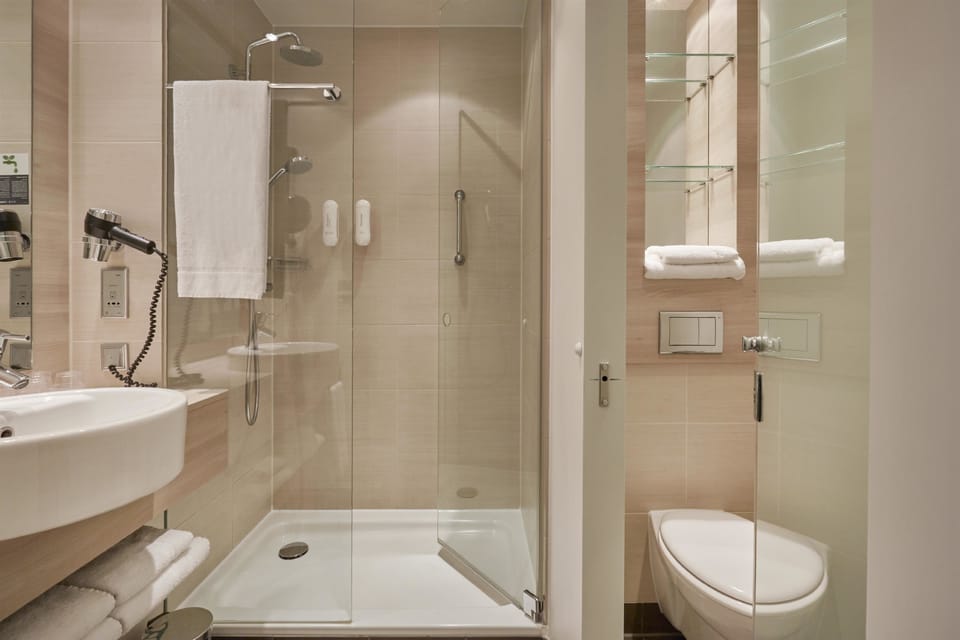 Shower, rainfall showerhead, eco-friendly toiletries, hair dryer