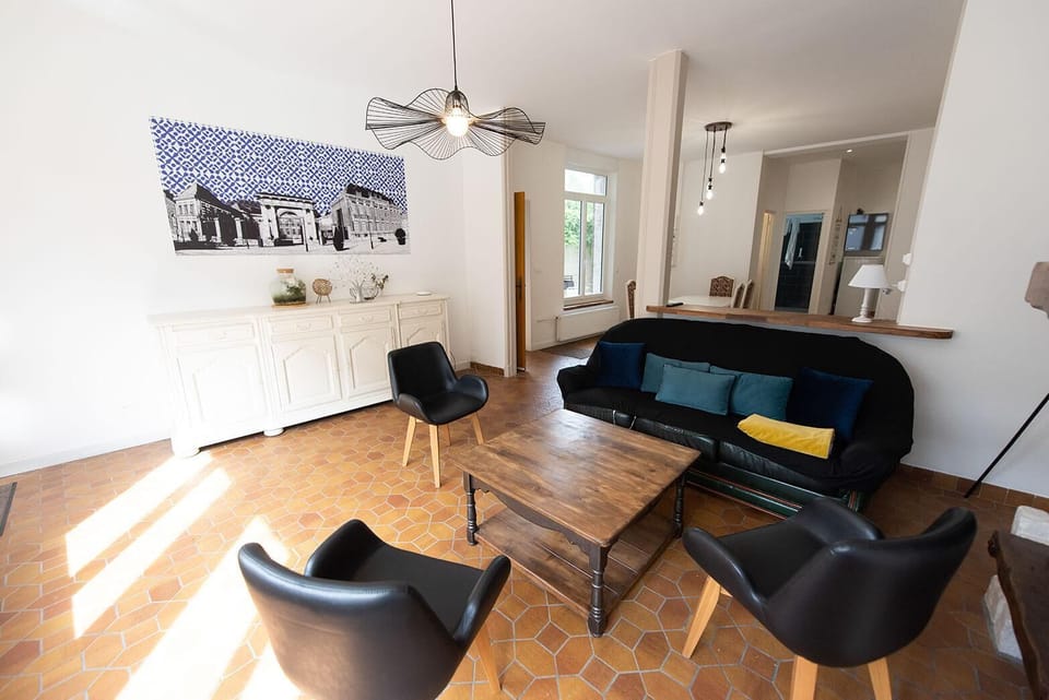 Quadruple Room | Living area | Flat-screen TV