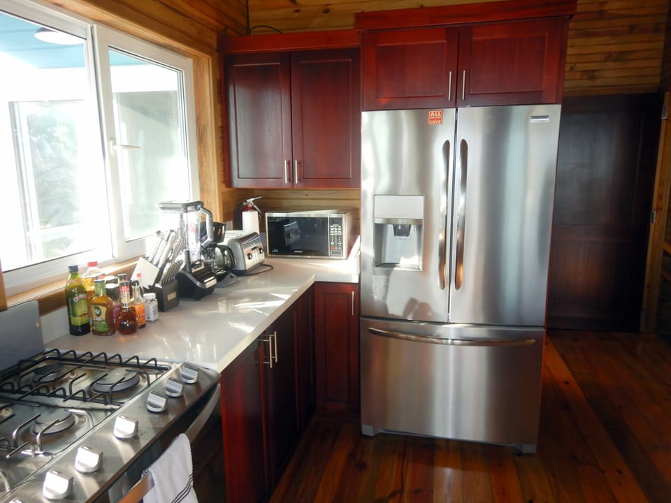 Full kitchen with modern appliances