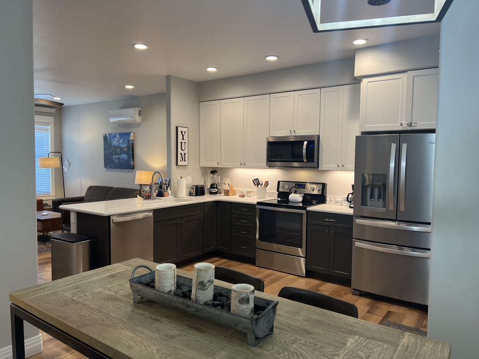 Large, fully stocked kitchen with brand new appliances. 