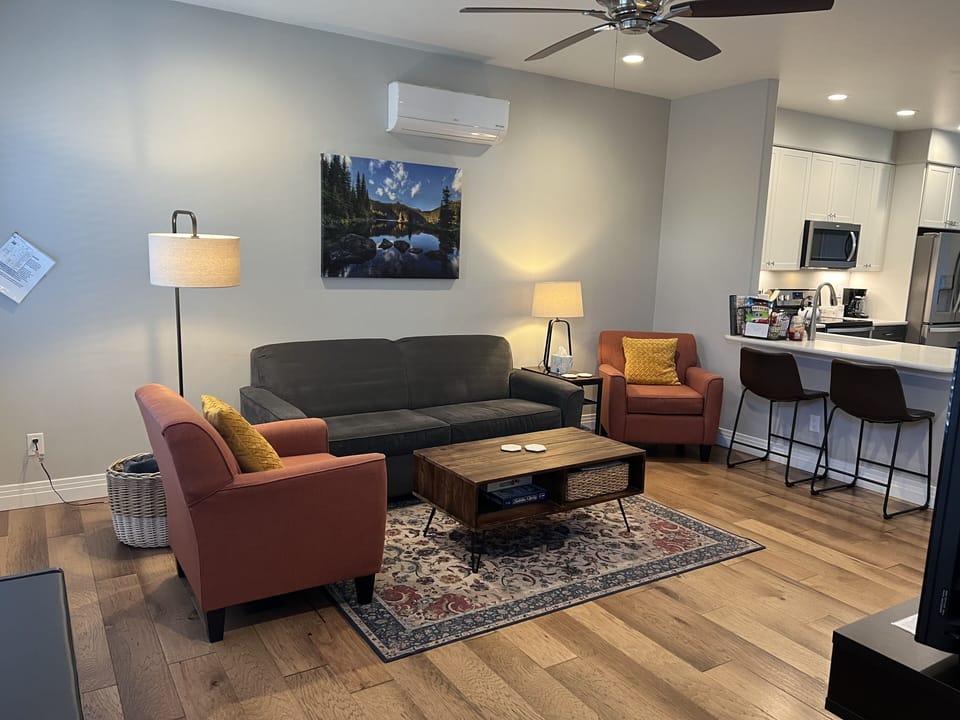 Open floor plan between living room and kitchen. 