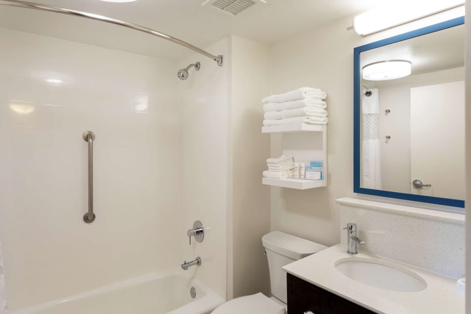 Standard Room, 2 Queen Beds | Bathroom | Combined shower/tub, free toiletries, hair dryer, towels