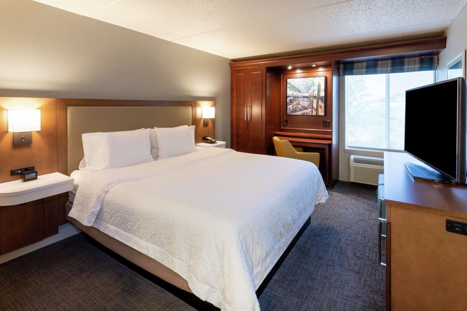 Premium bedding, desk, blackout drapes, iron/ironing board