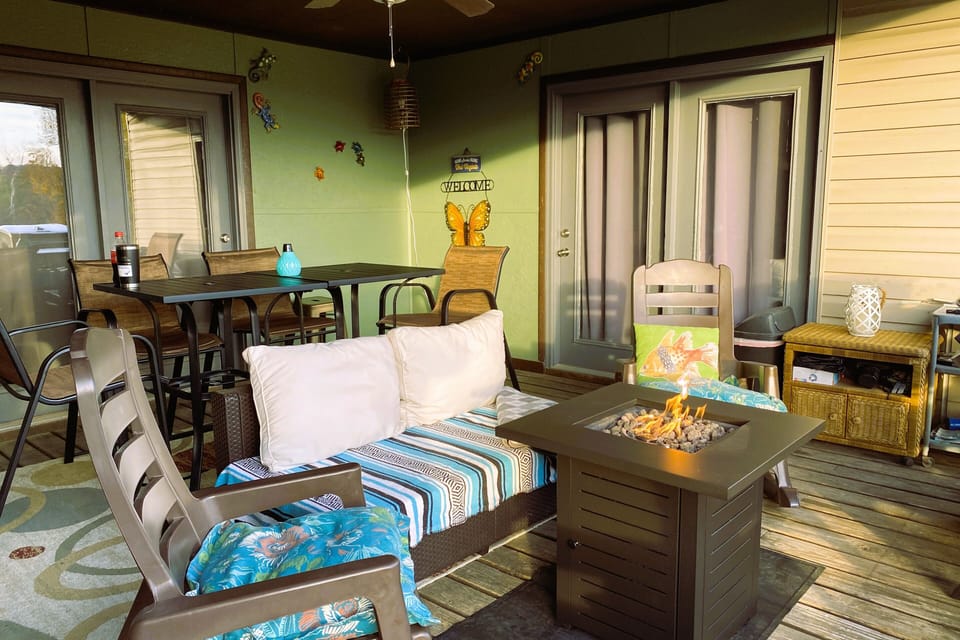 The back deck is a favorite guest spot to hang out!