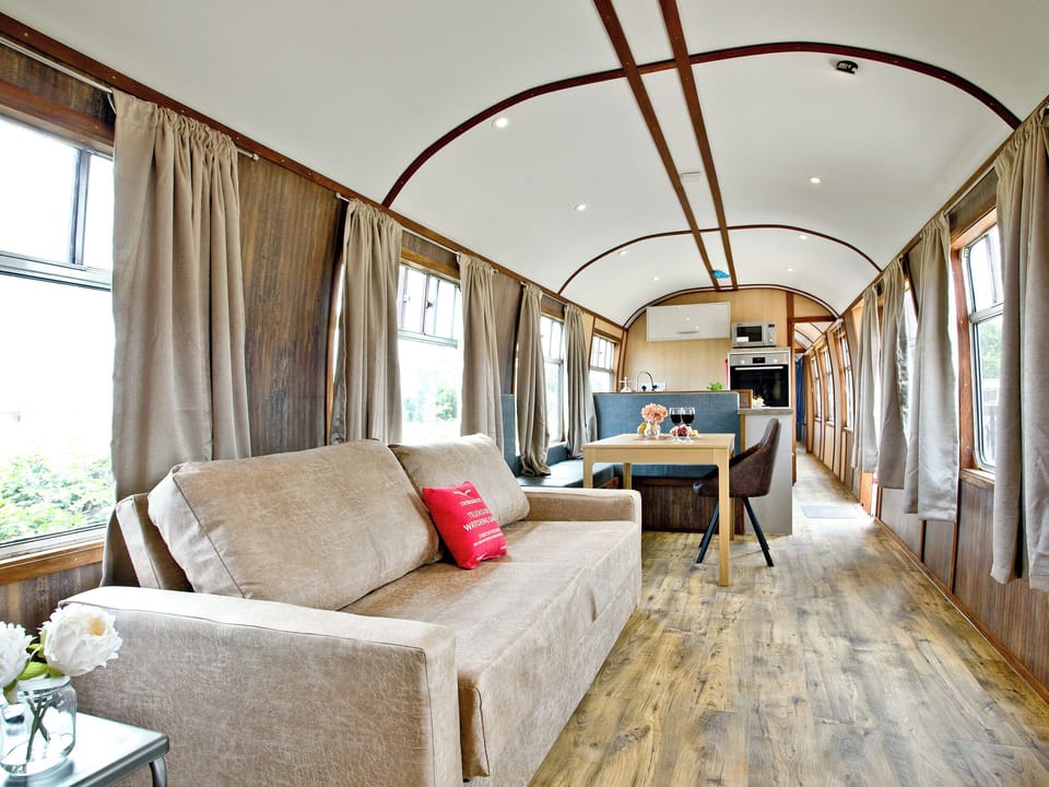 Well presented open plan living space | Brunel Boutique Railway Carriage No 4 - Brunel Boutique Railway Carriages, Dawlish Warren