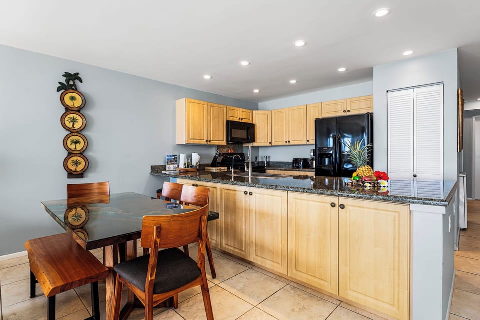 • Fully equipped kitchen with granite counters, new appliances, and bar seating—cook with a view.
