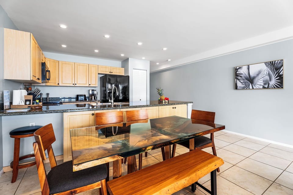 Dining area seats six and opens directly to the kitchen and living space—perfect for group meals or game nights.