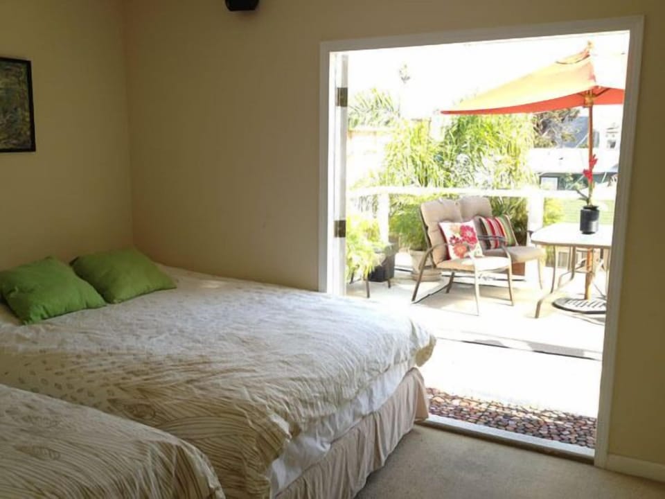Second Bedroom with French Doors Opening to Large Deck