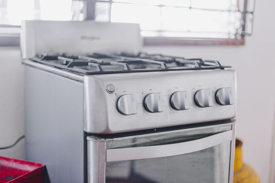 we also have a stainless steel stove with 4 burners and oven.