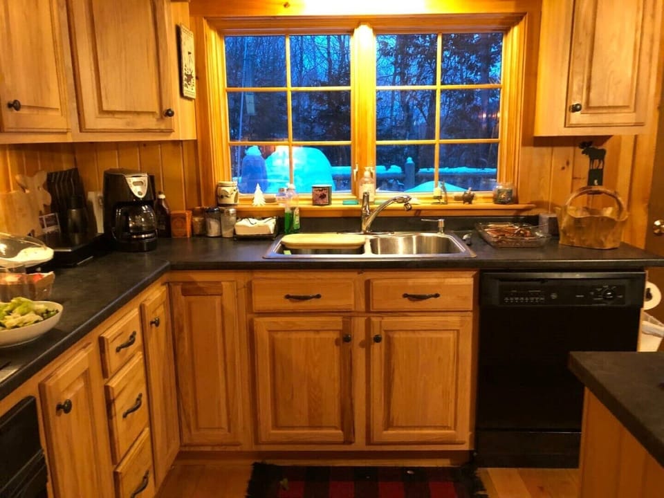 Full kitchen with indoor grill and many other amenities for family gatherings.