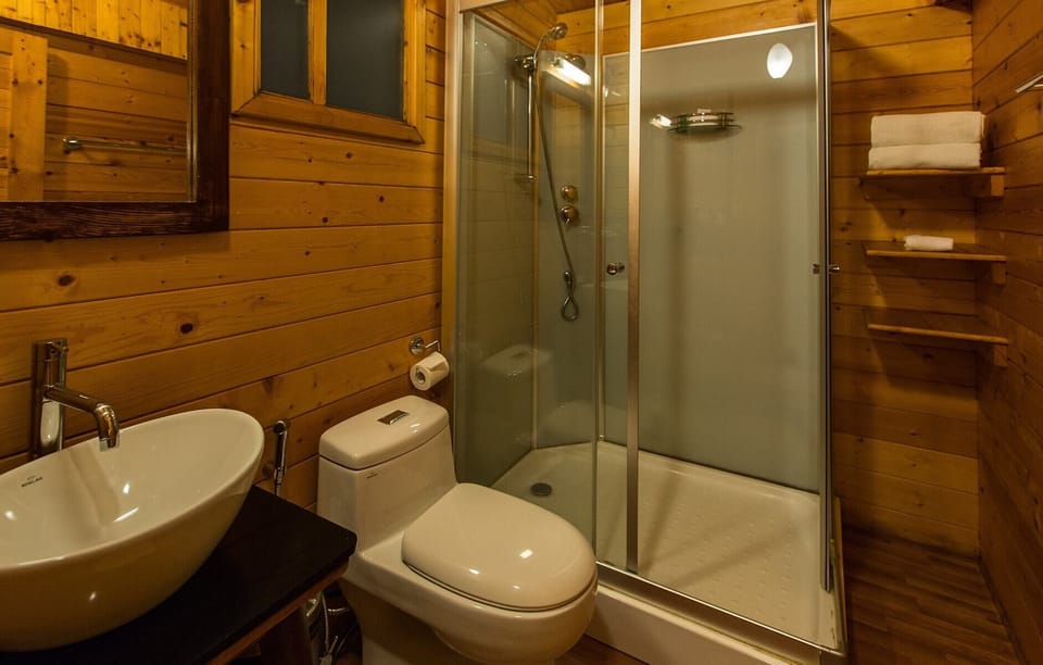 Shower, free toiletries, hair dryer, slippers