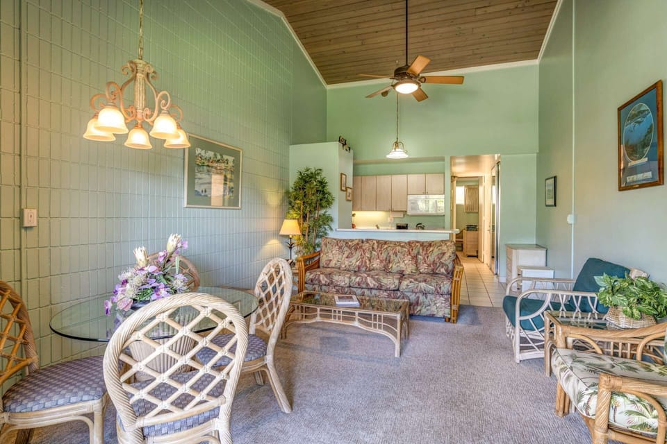 Indoor dining seating for four people and Lanai dining seating for four people.