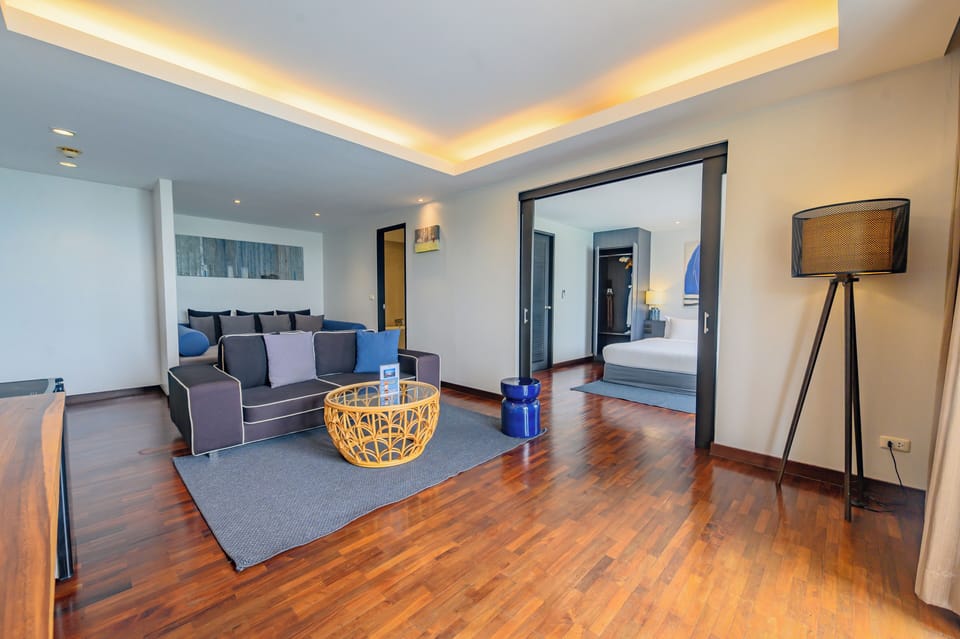 Samui Ocean View Suite - Adults Only | Living area | Flat-screen TV