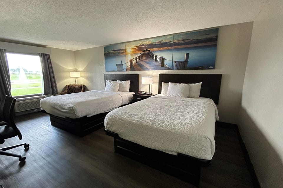 In-room safe, desk, iron/ironing board, cribs (free)