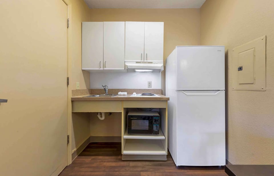 Studio, 1 Queen Bed, Accessible, Non Smoking | Private kitchen | Fridge, microwave, stovetop, coffee/tea maker
