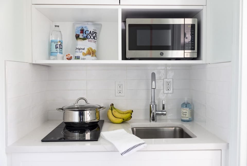 Coffee/tea maker, fridge, shared microwave