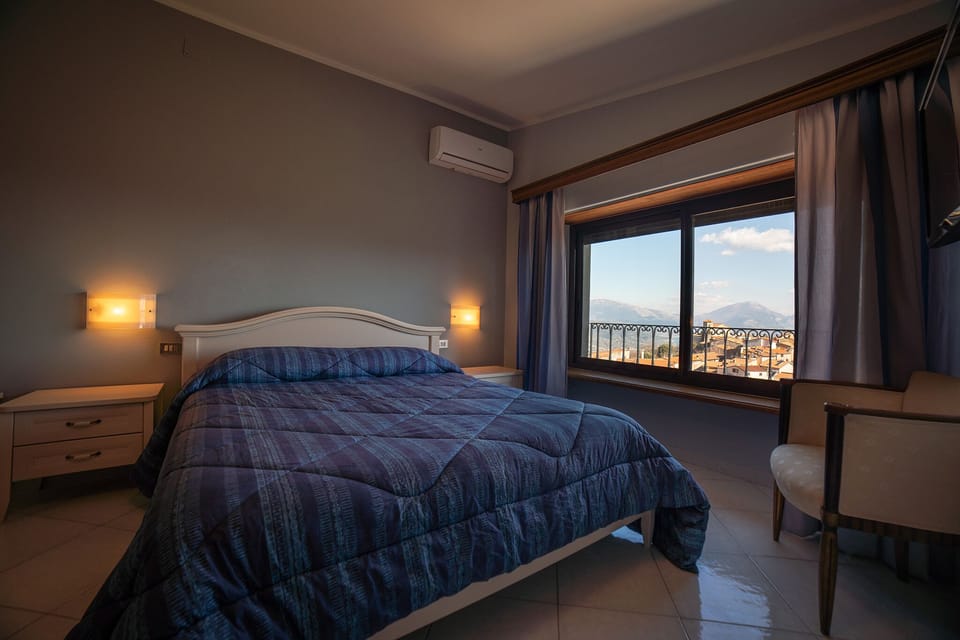 Panoramic Triple Room, Sea View | Minibar, desk, free WiFi, bed sheets