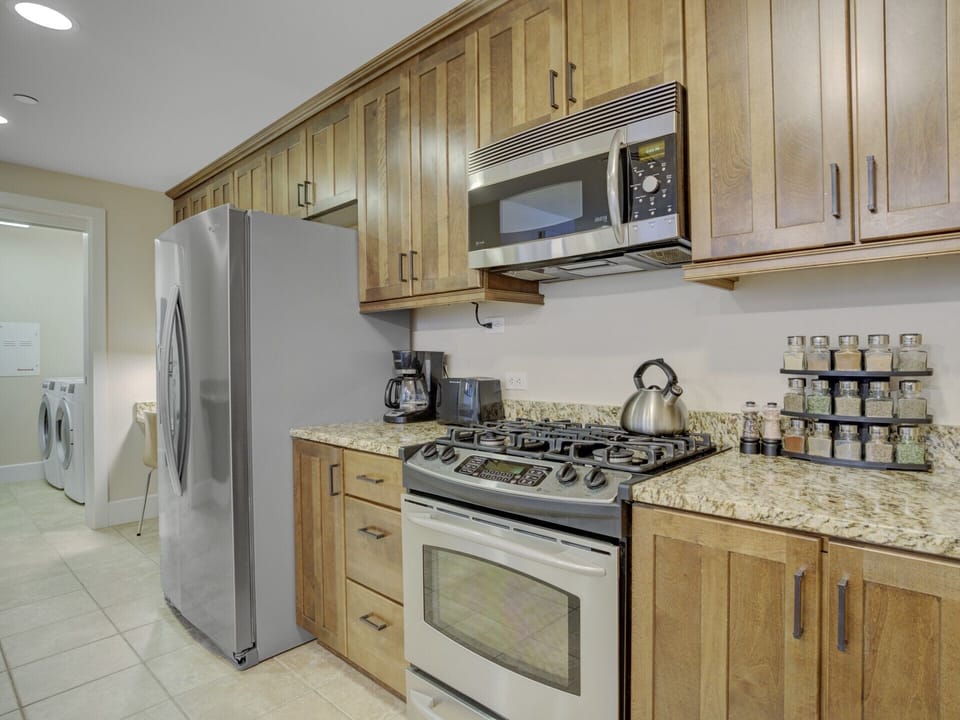 Condo 131 - Kitchen with Personal Laundry Room