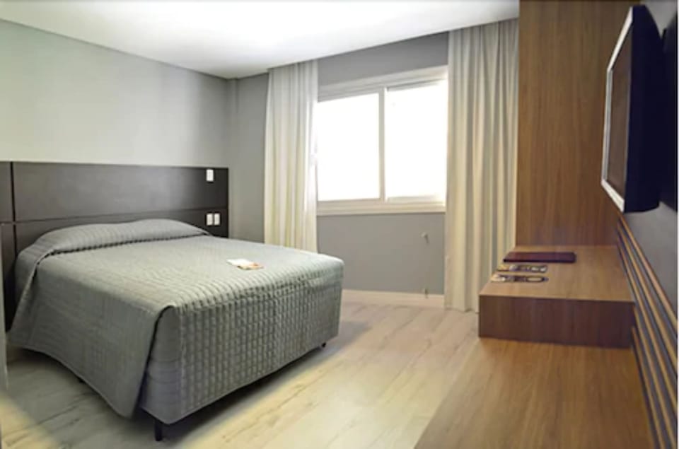 Deluxe Double Room | Minibar, desk, blackout drapes, soundproofing