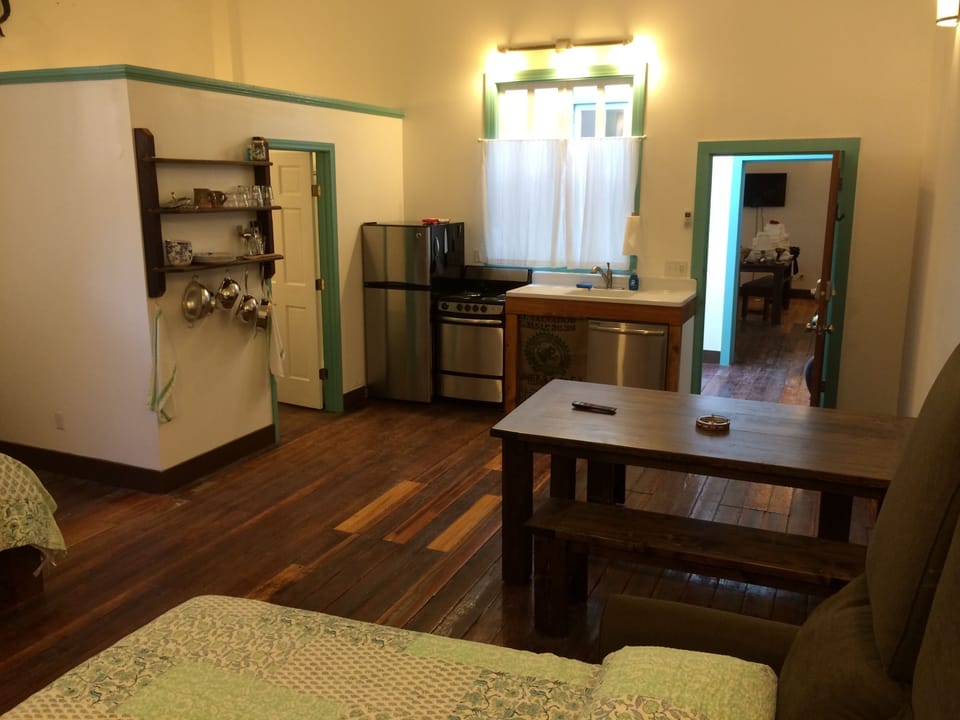 Full kitchen with ice maker.