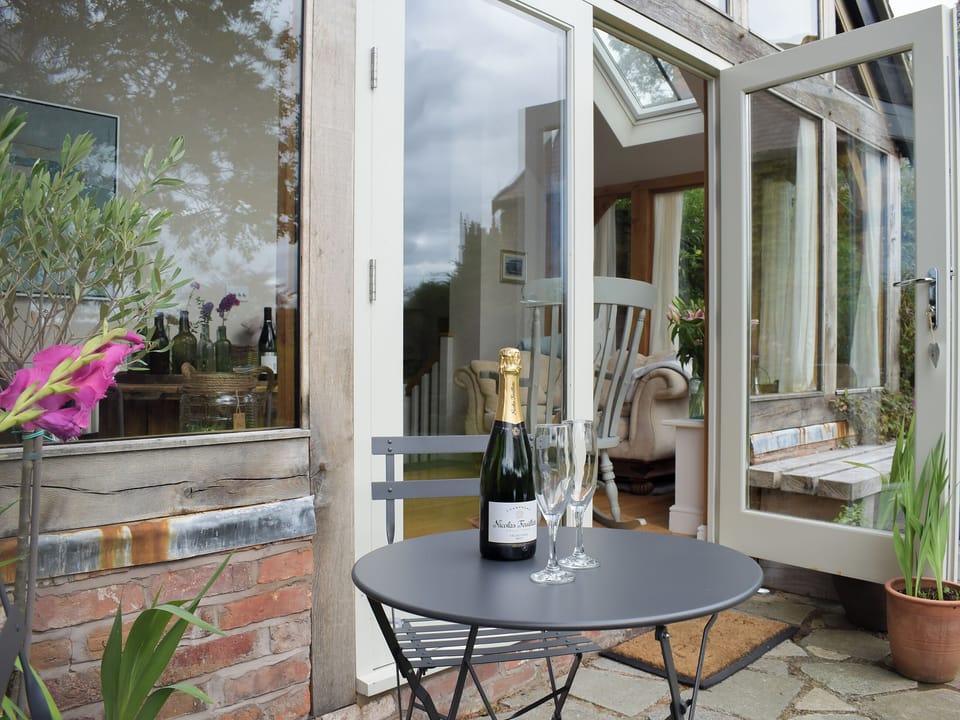 Lovely sunny sitting out area | The Garden Retreat, Marbury, near Whitchurch