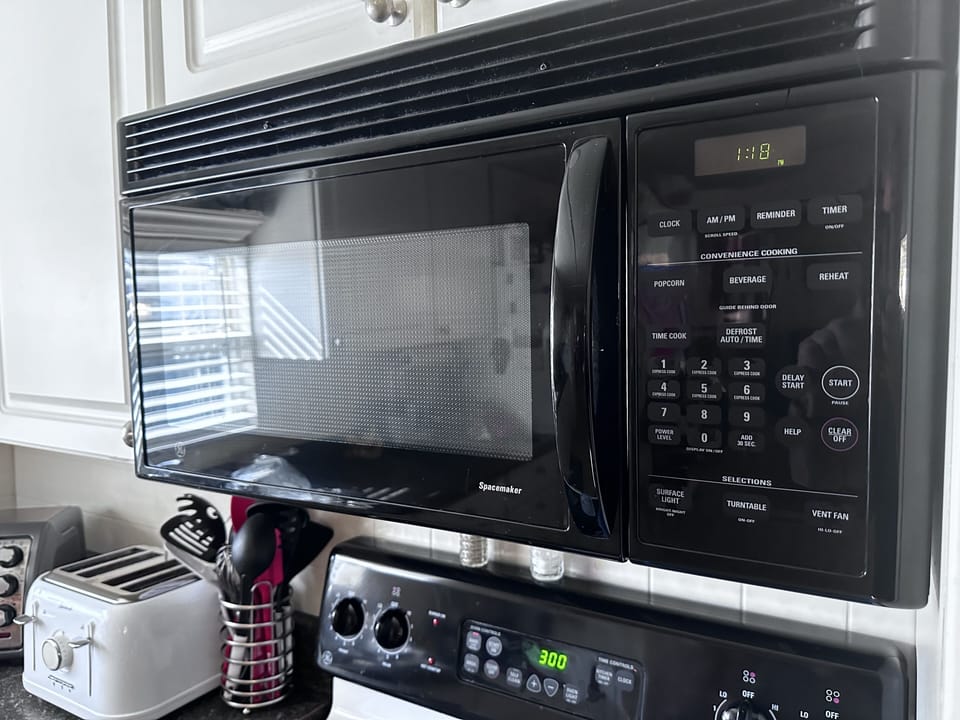Built-in microwave with hood fan/light for a quick reheats.