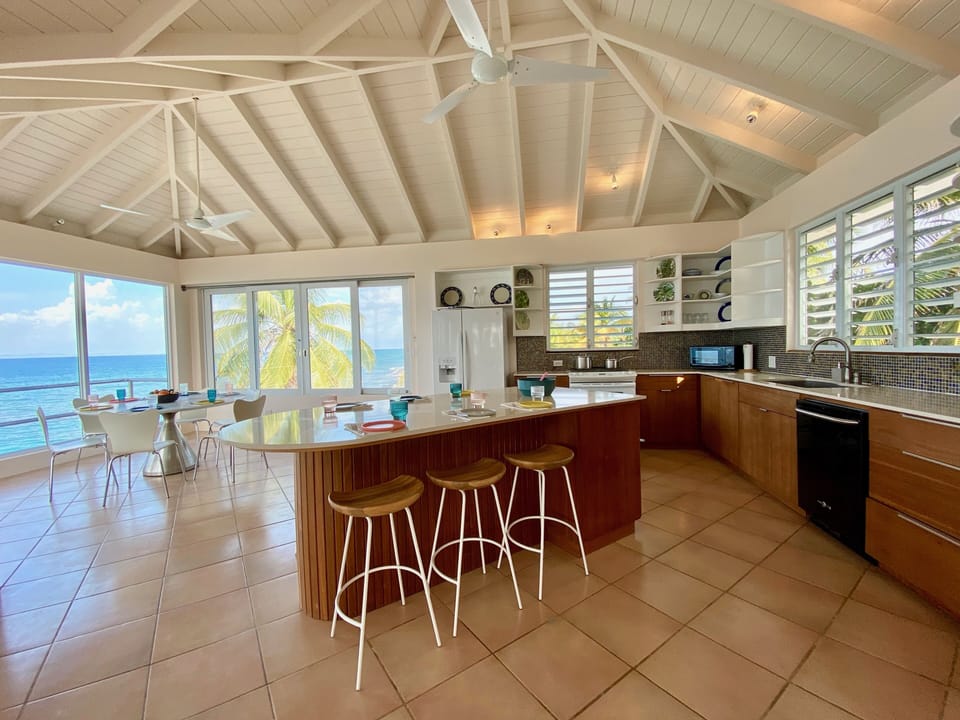 Kitchen, island and dining area with seating for 12 people 
